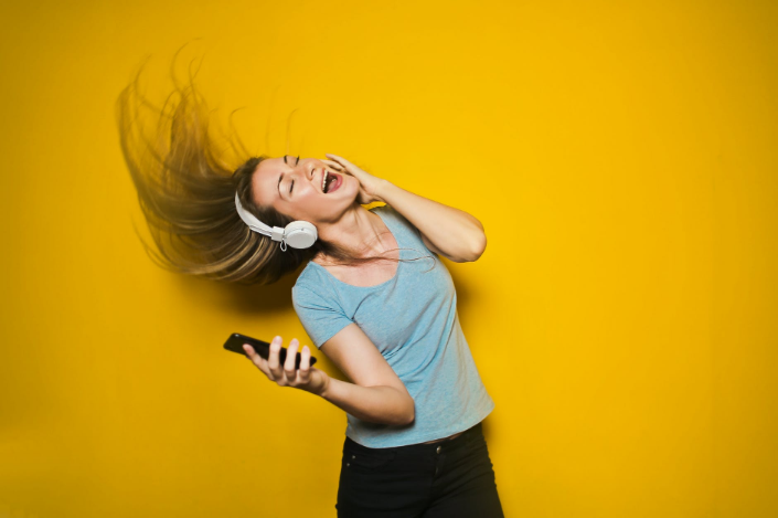 a woman listening to songs